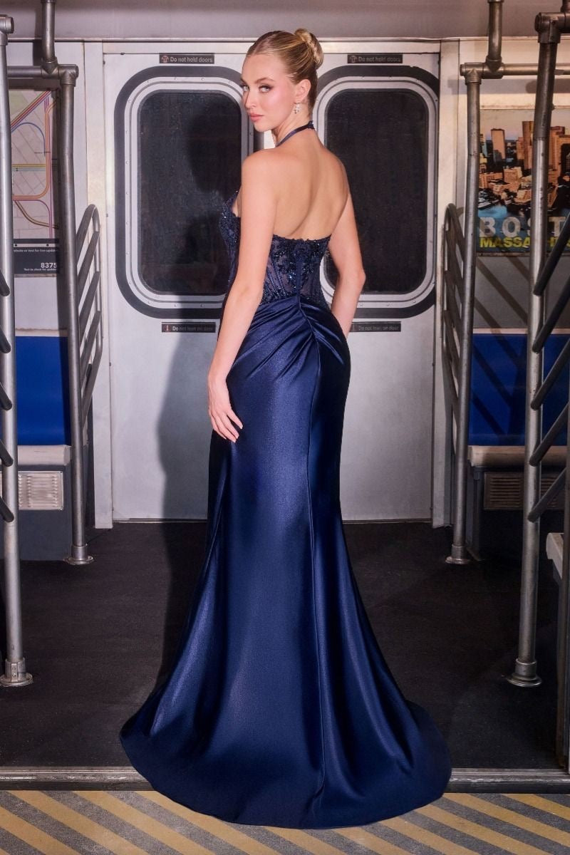 Radiate Ann elegance in this fitted halter gown featuring