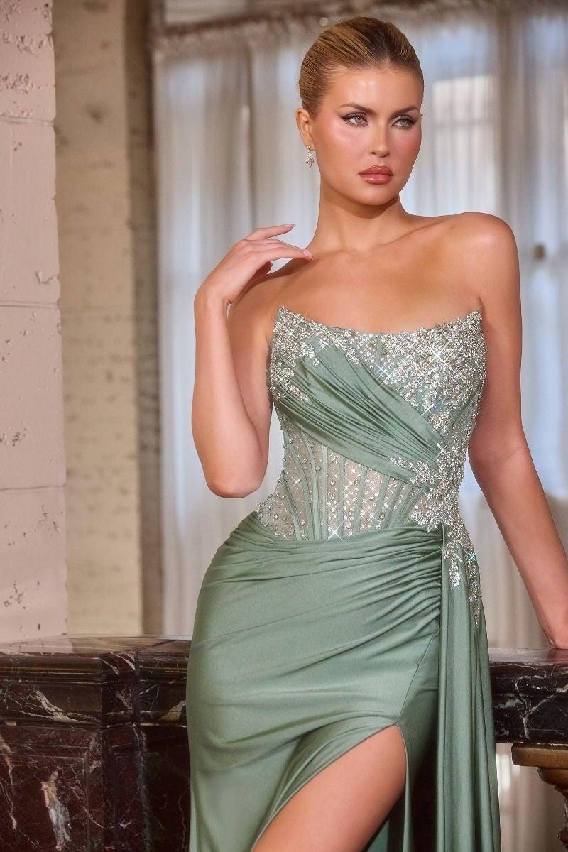 This stunning Ann fitted gown captivates with its asymmetrical strapless