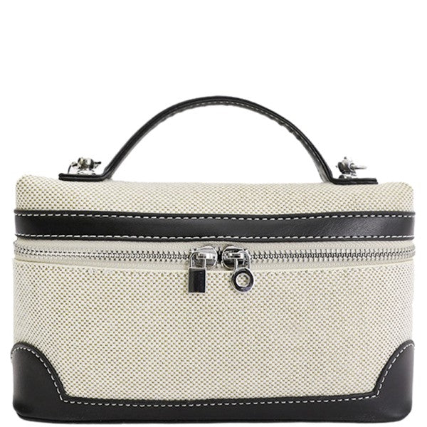 Bolso beige con detalles negros, vista frontal