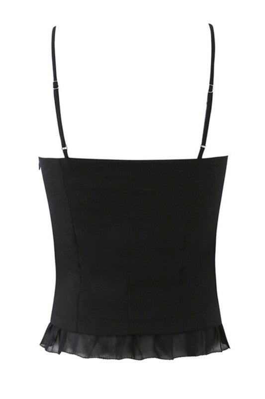Espalda de la blusa negra de tirantes